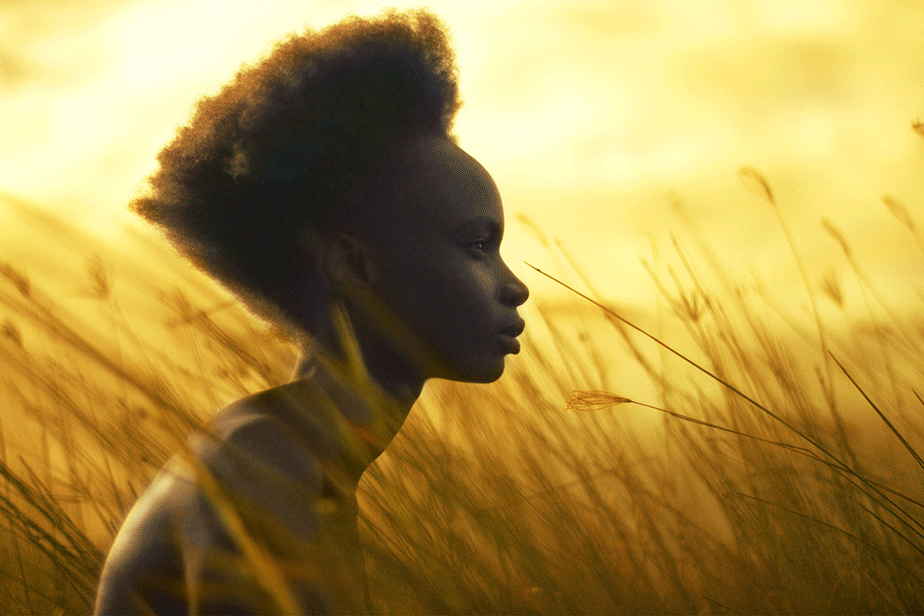 Map of the Heart gold heart V.4 gold lookbook image - woman in field with golden light