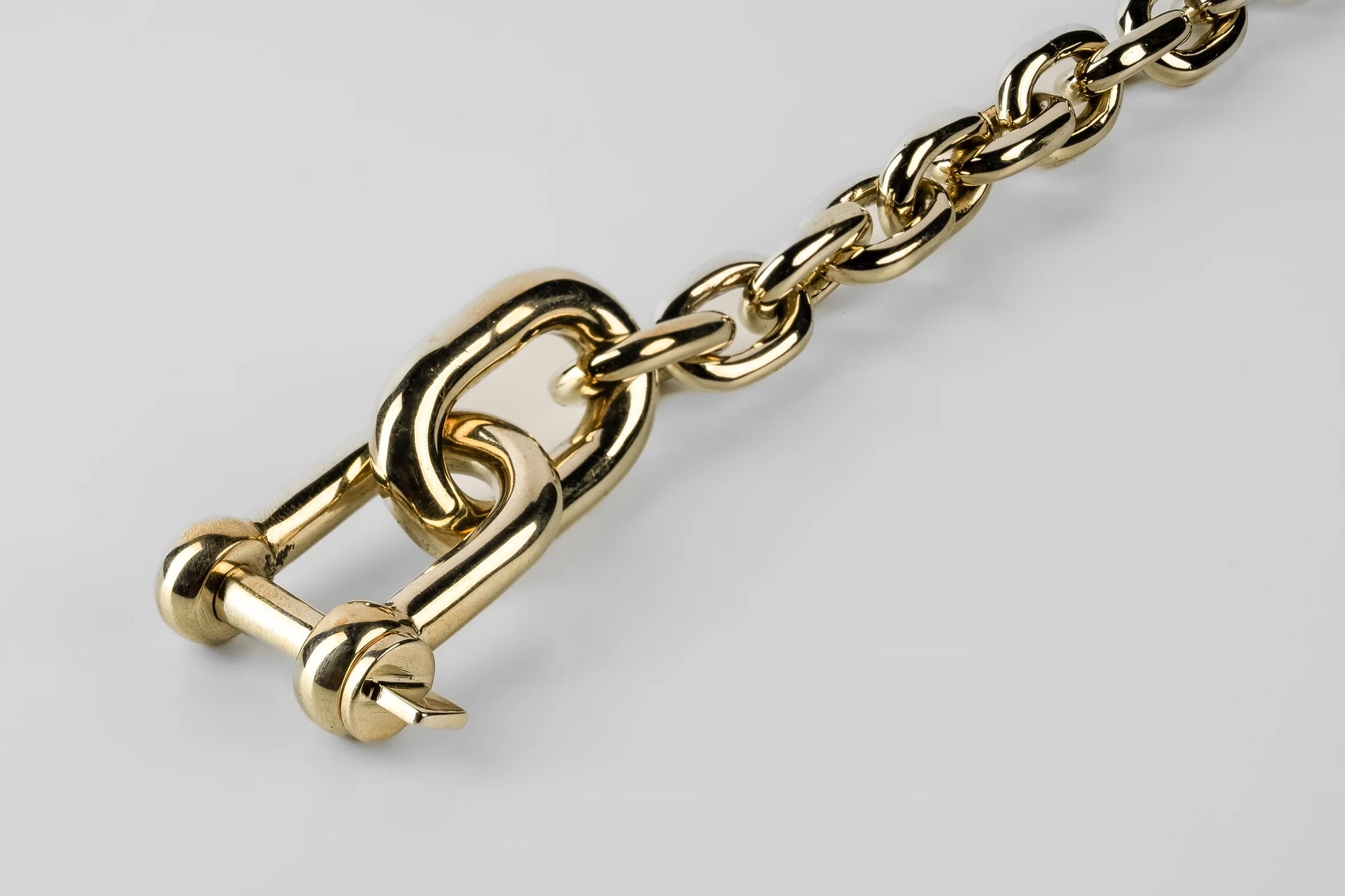 Grade chain charm necklace - polished brass